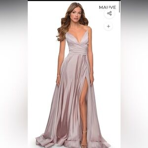 Selling this beautiful satin dress in size 4. New with tags.